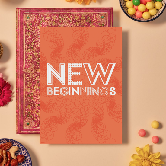 Card with bold white text reading ‘NEW BEGINNINGS’ in a mix of geometric fonts, including dotted, striped, and outlined styles. The background is a vibrant orange featuring intricate mandala patterns made up of overlapping geometric shapes and spiralling circles, creating a sense of flow, renewal, and positive energy.