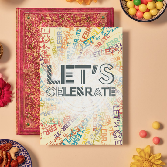 Card with bold dark grey text reading ‘LET’S CELEBRATE’ in a mix of striped and geometric fonts. The background features a lively mandala pattern formed by repeating the phrase ‘LET’S CELEBRATE’ in multiple bright colors, red, yellow, blue, orange, and purple, radiating outward in circular layers, creating a festive and energetic design.