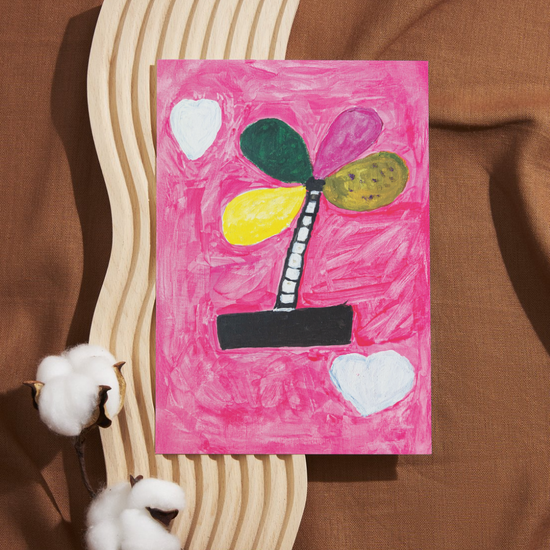 A bold and joyful painting of a flower with four large petals, green, yellow, pink, and olive, sprouting from a striped black-and-white stem in a black pot. The background is hand-painted in a rich, textured pink, with three soft white hearts floating around the flower. The playful design radiates hope and creativity, offering a heartfelt and uplifting message.